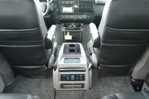 Move your Team in Comfort with All of the Fun Entertainment Options Conversion Van Land