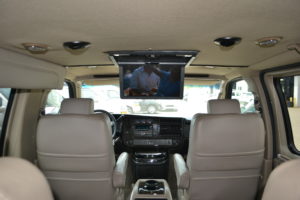 Move your Team in Comfort with All of the Fun Entertainment Options Conversion Van Land